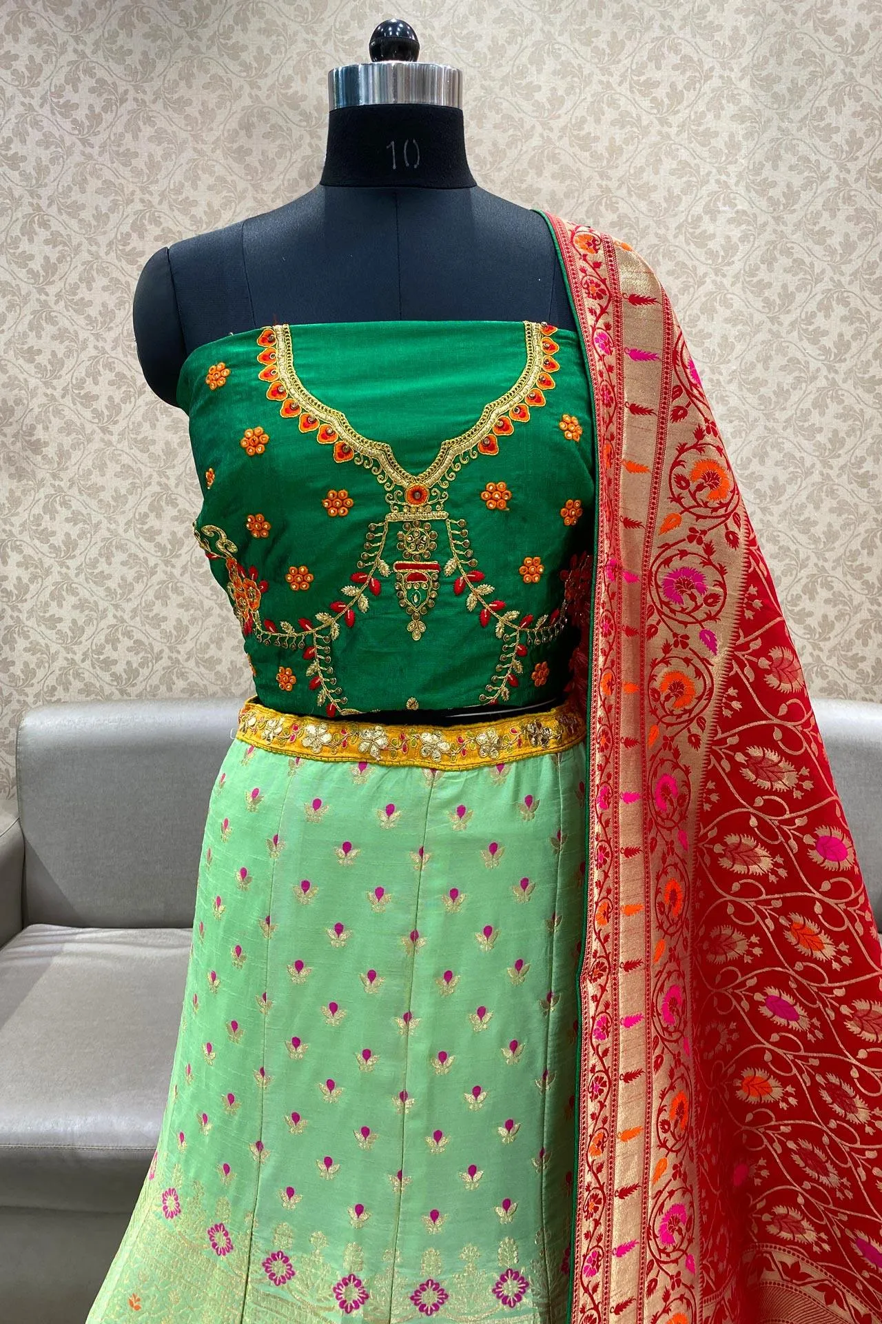 Green Banarasi Semi-Stitched Lehenga with Contrast Red Duppata